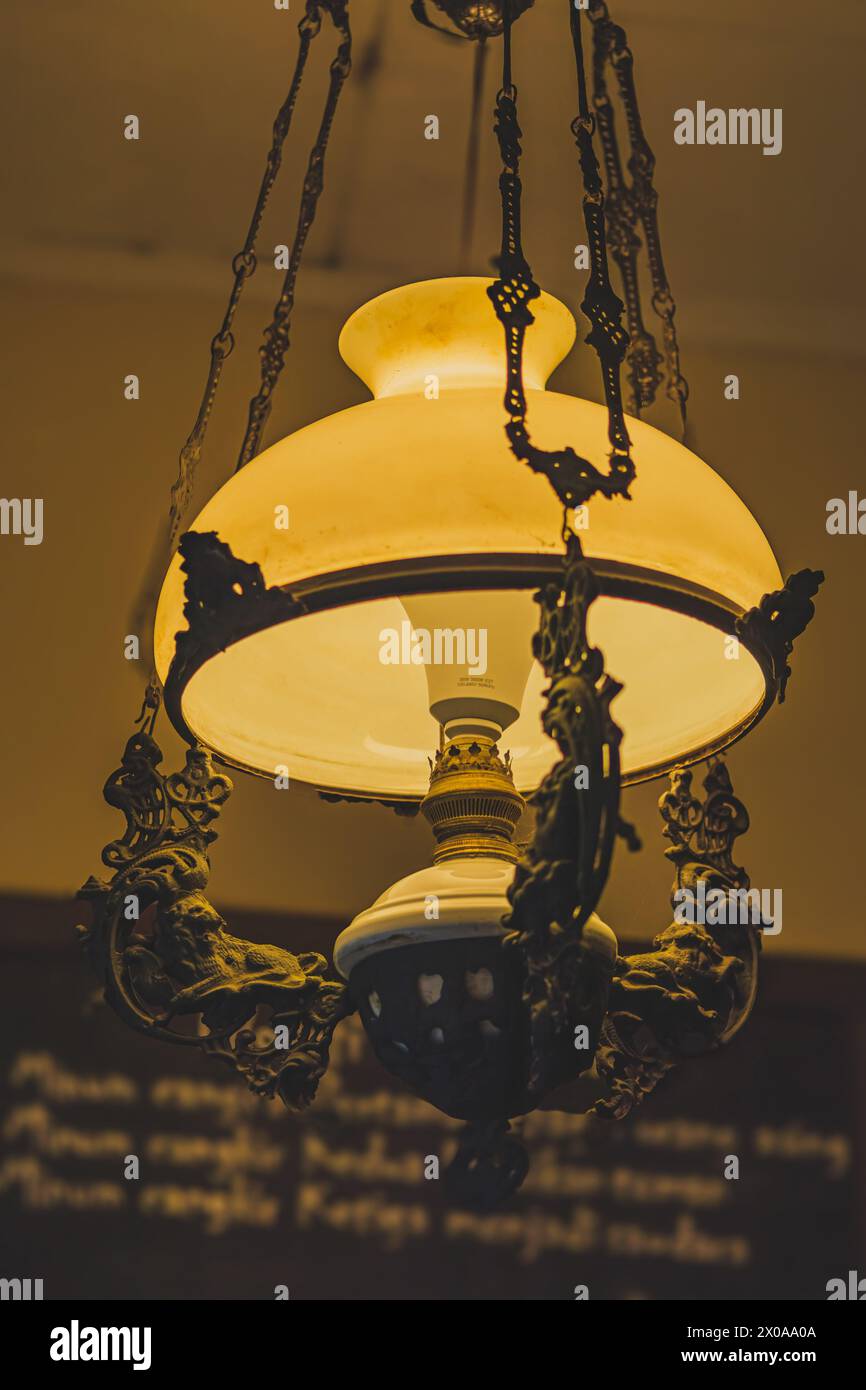 Dutch Brass Chandelier with Javanese Figural Warrior Dutch Brass Chandelier with Javanese Figural Warrior