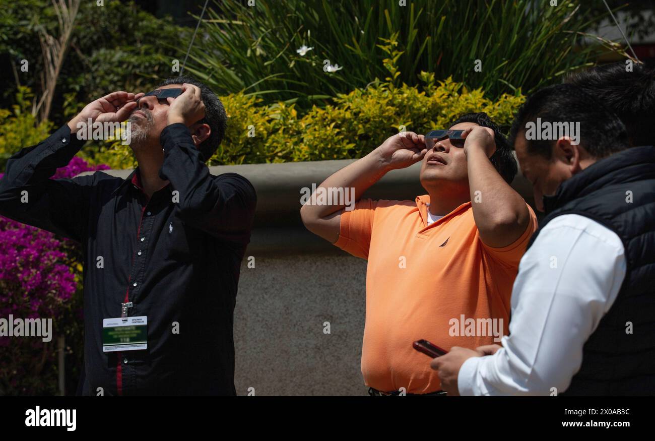 People in Mexico City, Mexico observe the solar eclipse of 8 April 2024