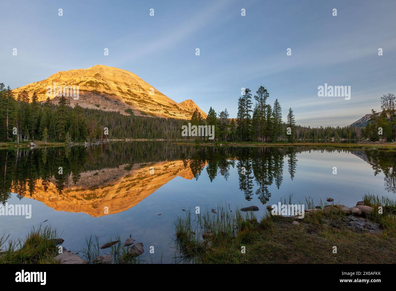 Sunrise on Bald Mountain reflected in Mirror Lake, Wasatch-Cache National Forest, Uinta Mountains, Utah Stock Photo