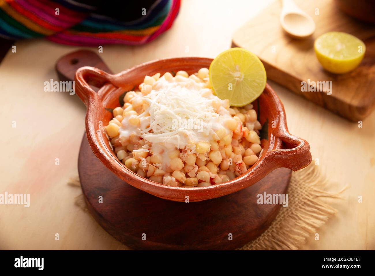 Esquites. Corn kernels cooked and served with mayo, sour cream, lemon