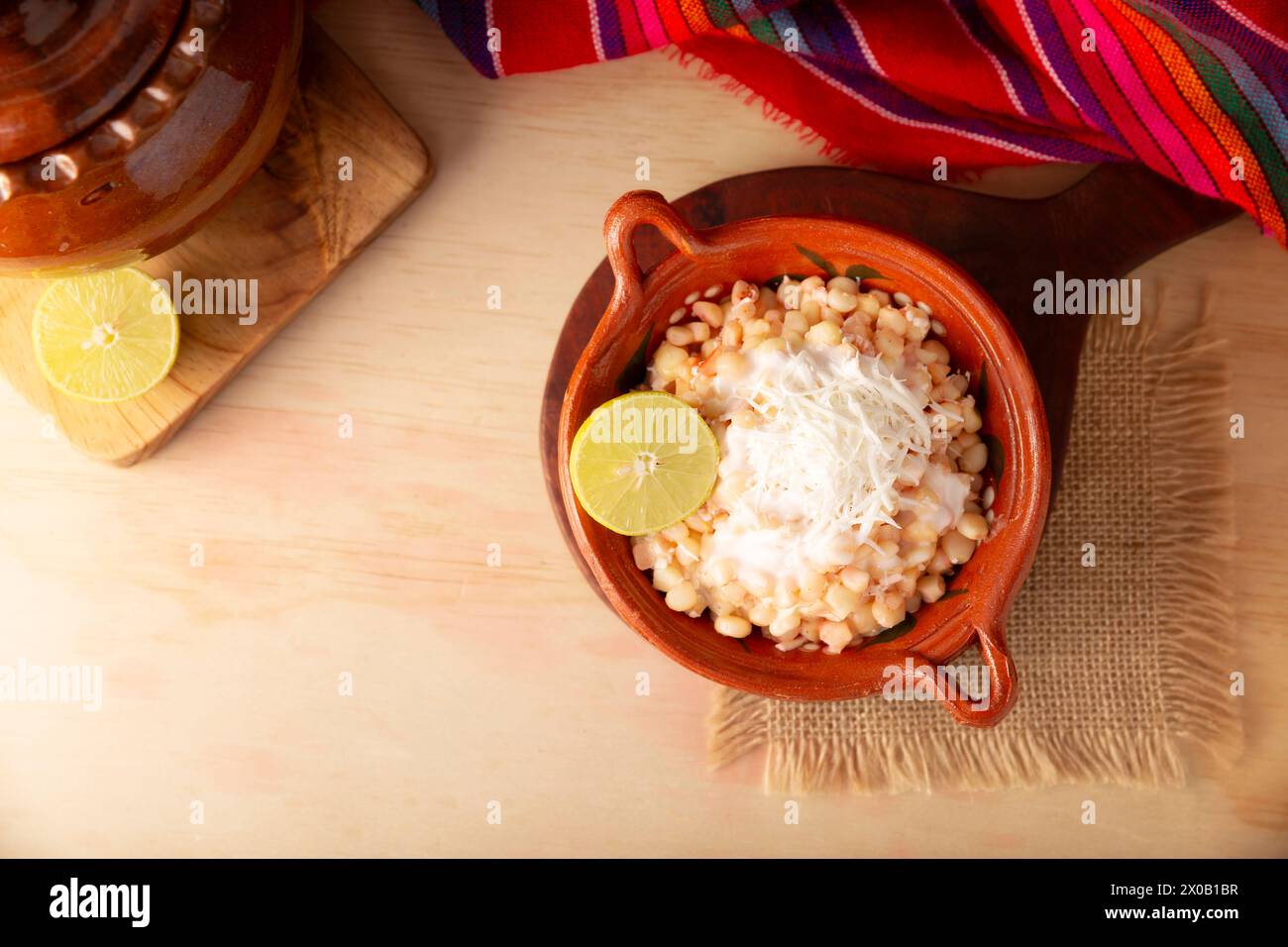 Esquites. Corn kernels cooked and served with mayo, sour cream, lemon
