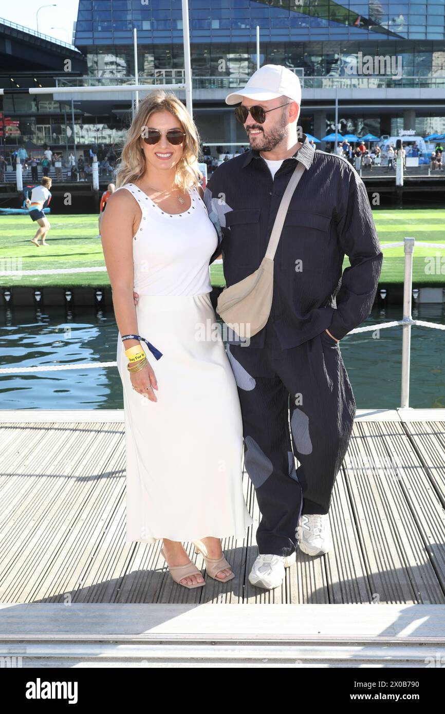 Sydney, Australia. 11th April 2024. The BSc Aqua Rugby Festival on a 30x30 metre floating pontoon at Darling Harbour. Pictured: CiCi Coleman (First Dates) and James Devlin (bartender on First Dates Australia). Credit: Richard Milnes/Alamy Stock Photo