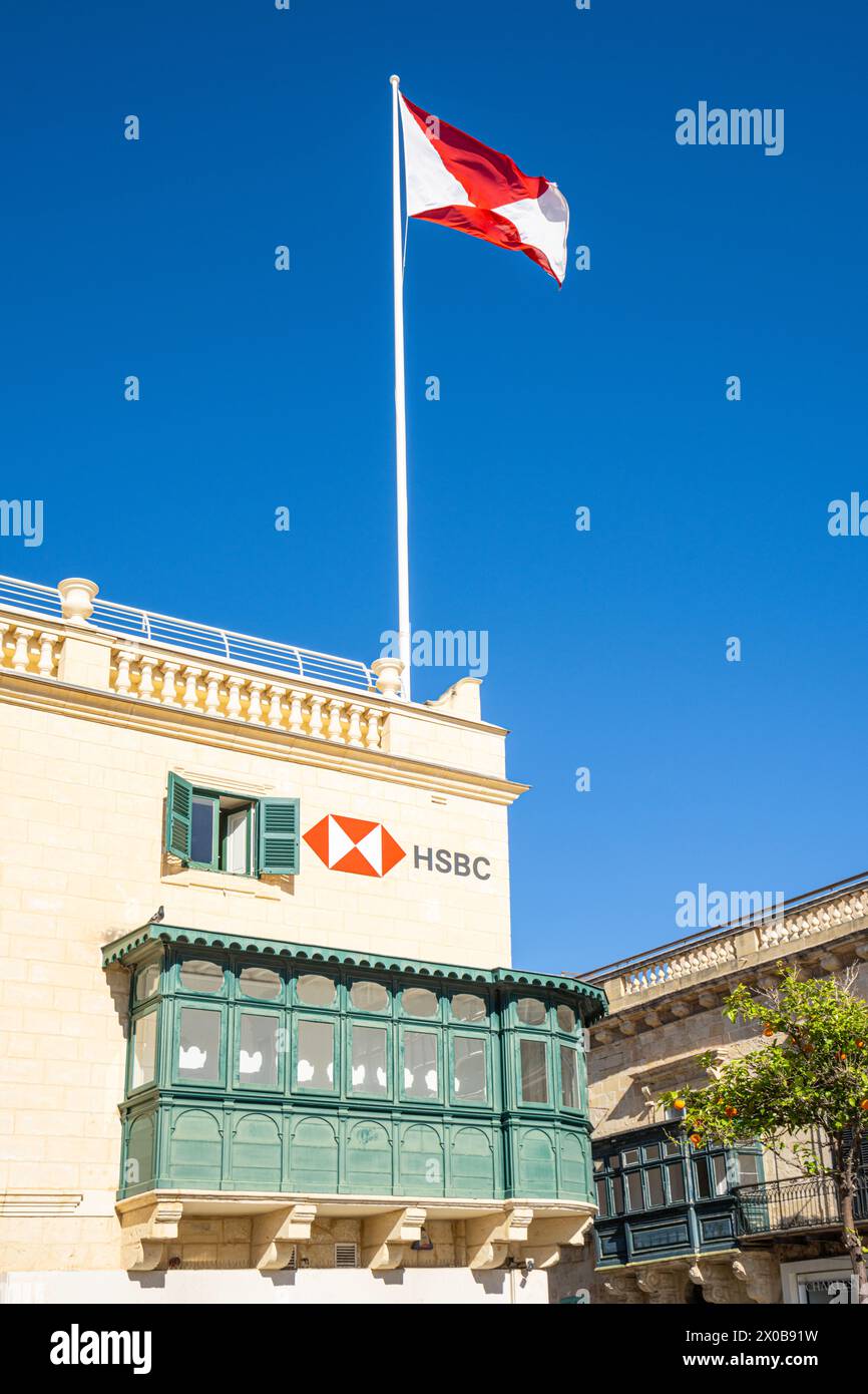 Valletta, Malta, April 03, 2024 The HSBC bank sign and flag in the city