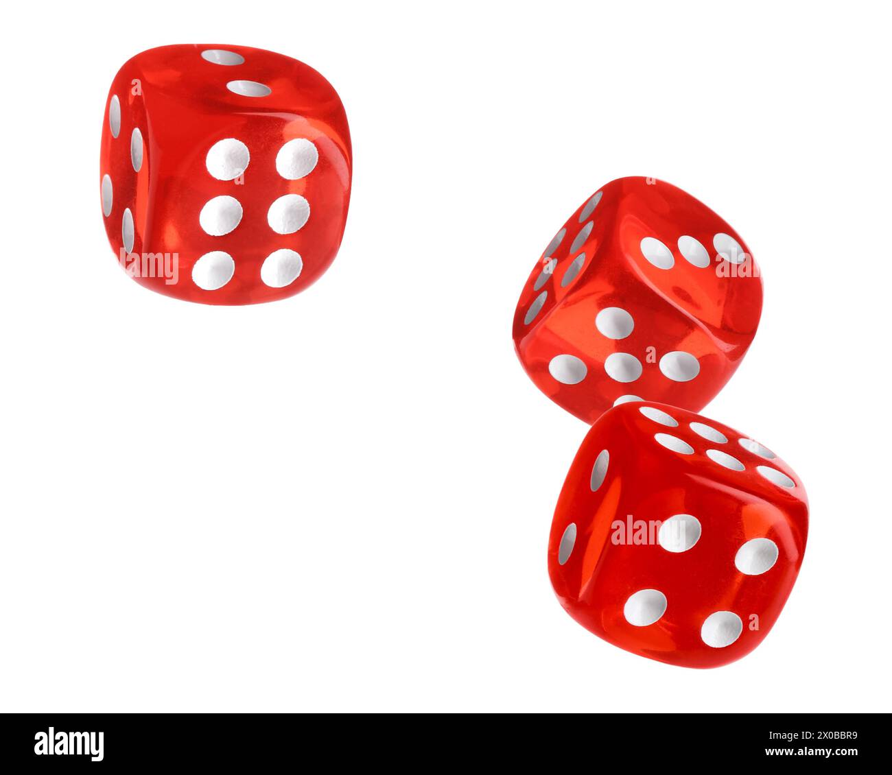 Three red dice in air on white background Stock Photo