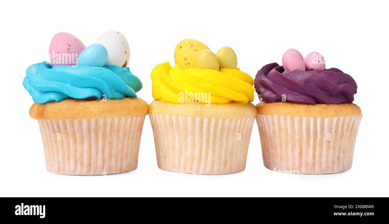 Tasty decorated Easter cupcakes isolated on white Stock Photo