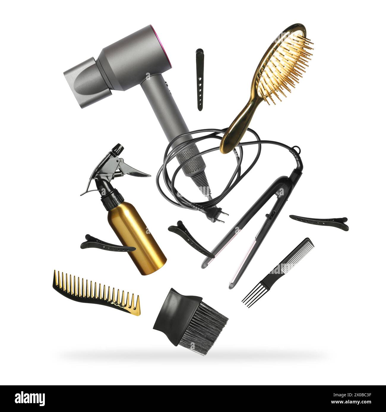 Professional hairdresser tools falling on white background Stock Photo ...