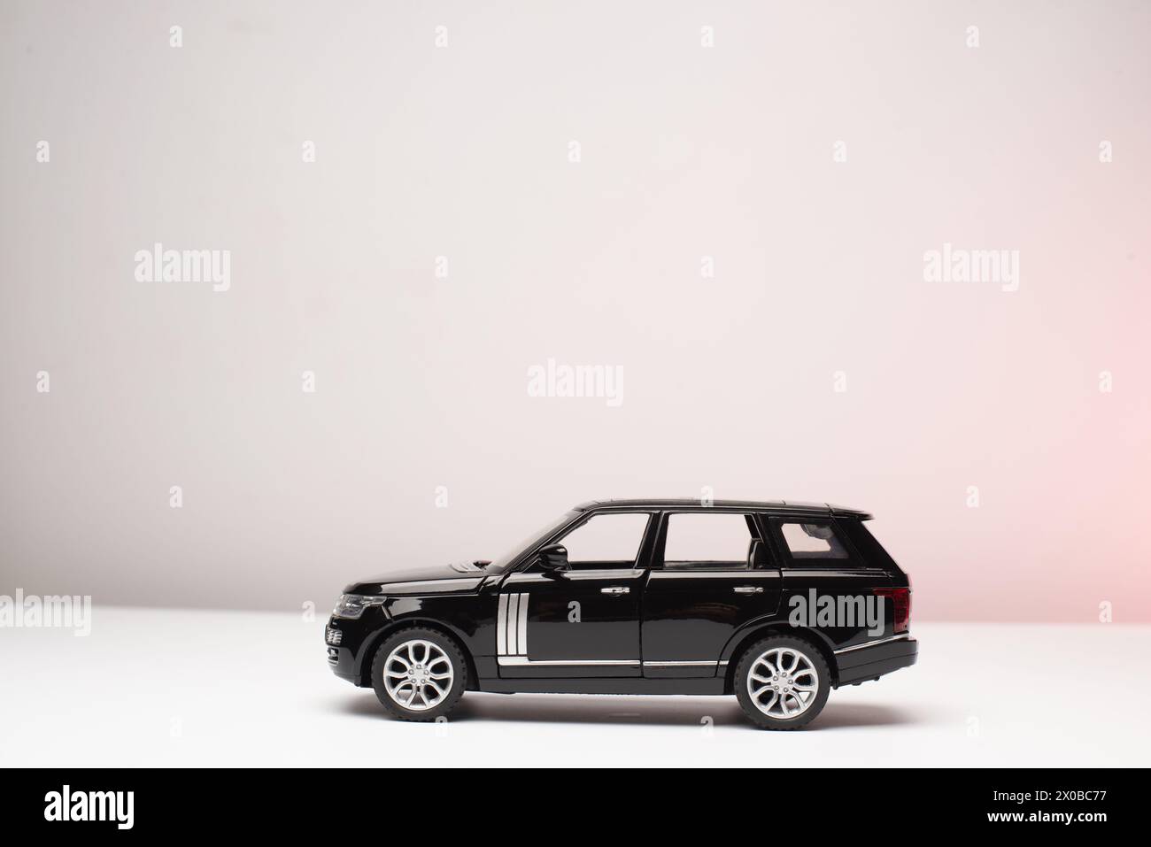 Black Toy car isolated on white background Stock Photo