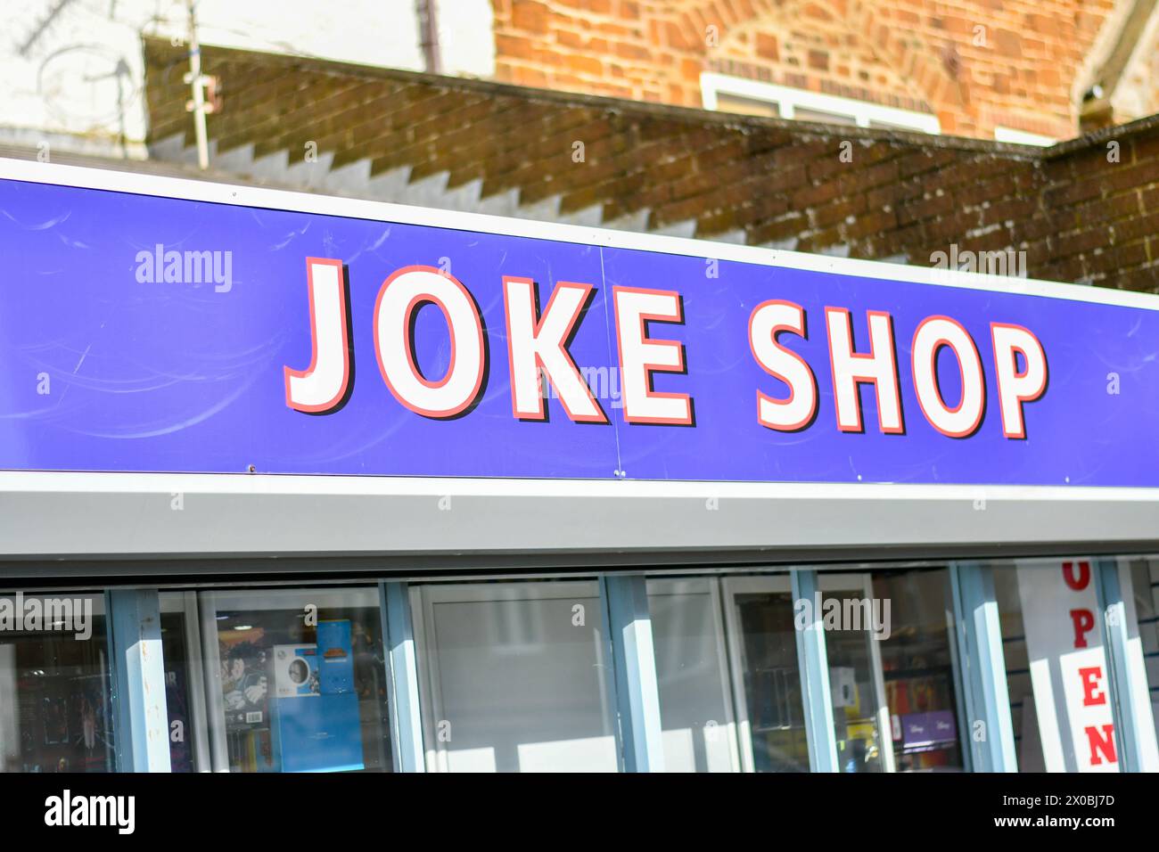 handstanton joke shop sign Stock Photo