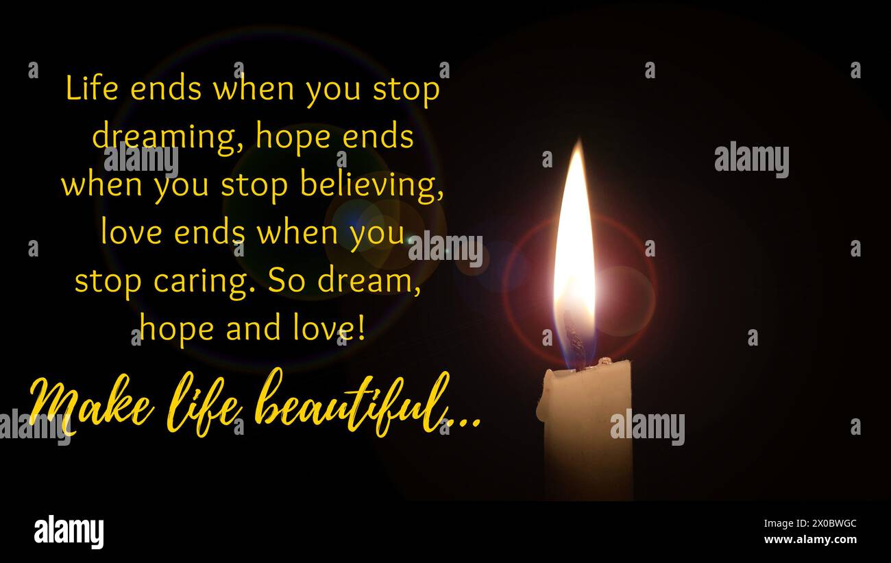 Make life beautiful quotes with candle lighting in the dark. Motivational concept. Stock Photo