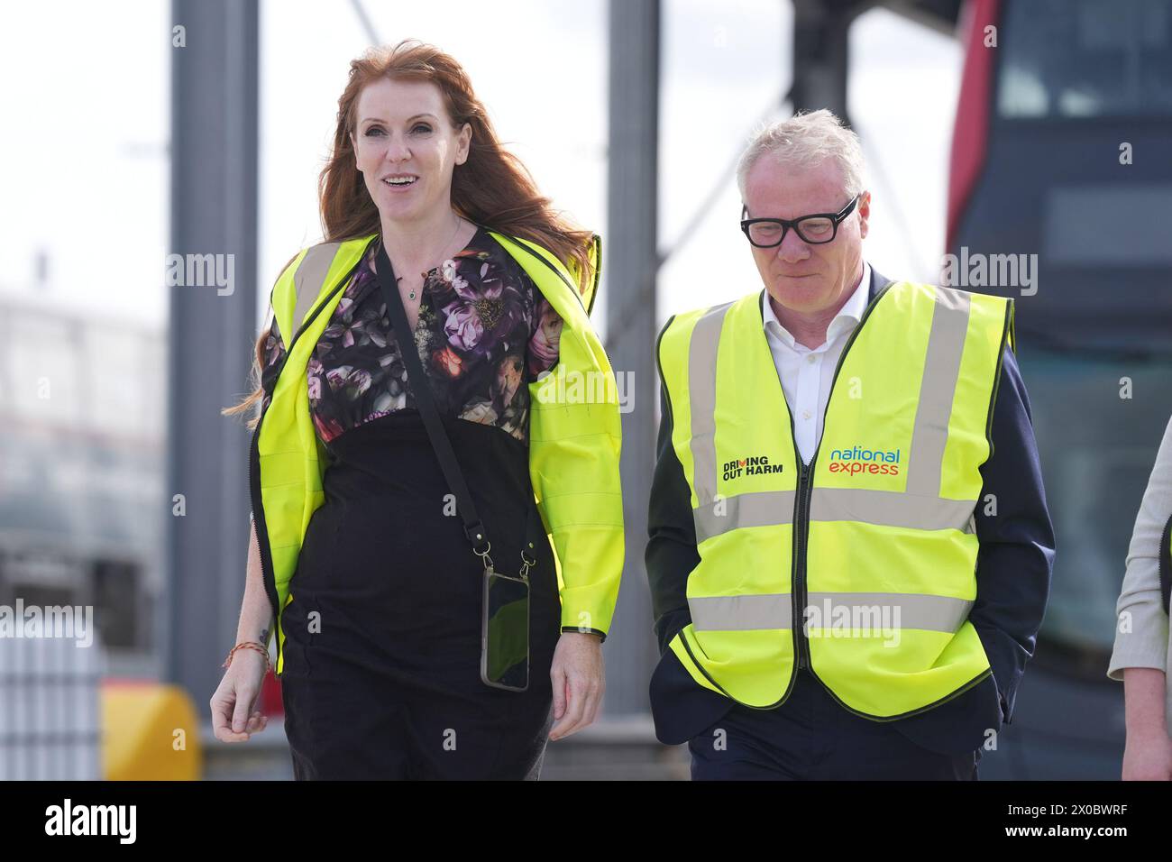 Labour Party deputy leader Angela Rayner and Richard Parker, Labour's West Midlands mayoral candidate, during a visit to Perry Barr bus depot in Birmingham, to set out Labour's plan for a better bus network across England. Picture date: Thursday April 11, 2024. Stock Photo