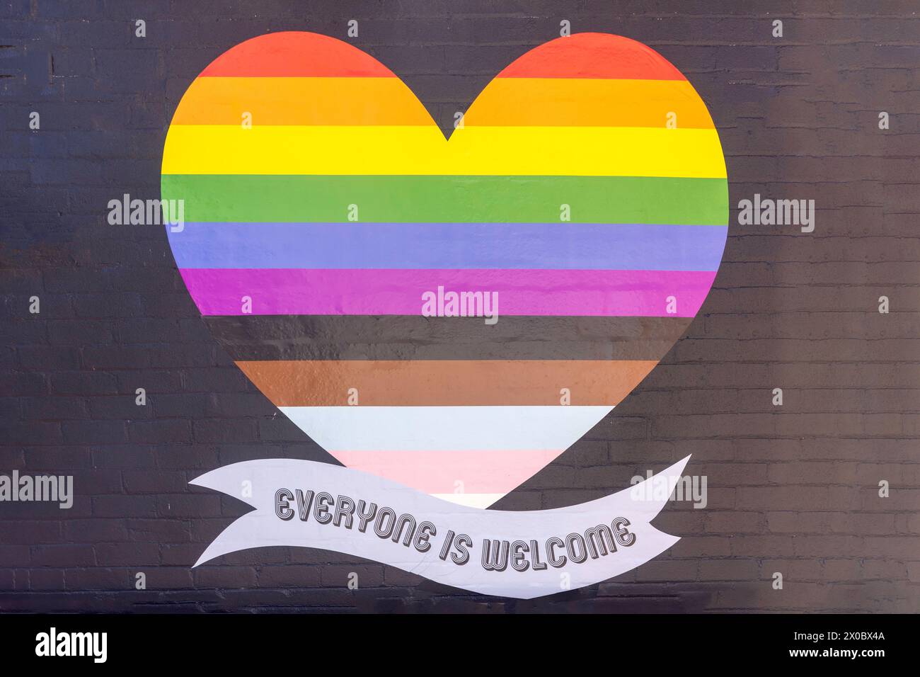 'Everyone is welcome' wall sign, Queen Street, Berry, New South Wales, Australia Stock Photo