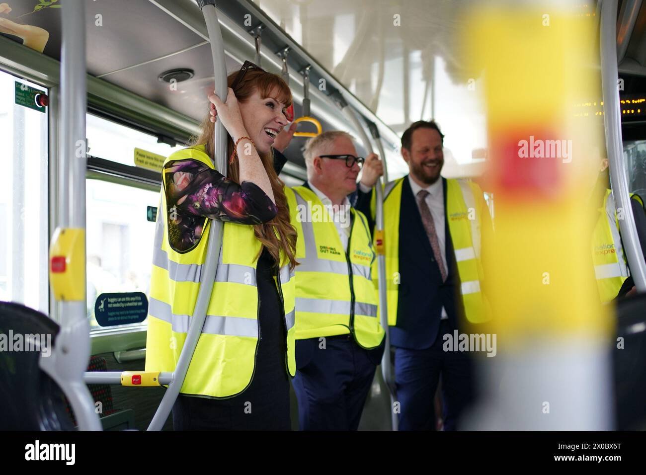 Labour Party deputy leader Angela Rayner and Richard Parker, (centre) Labour's West Midlands mayoral candidate, during a visit to Perry Barr bus depot in Birmingham, to set out Labour's plan for a better bus network across England. Picture date: Thursday April 11, 2024. Stock Photo