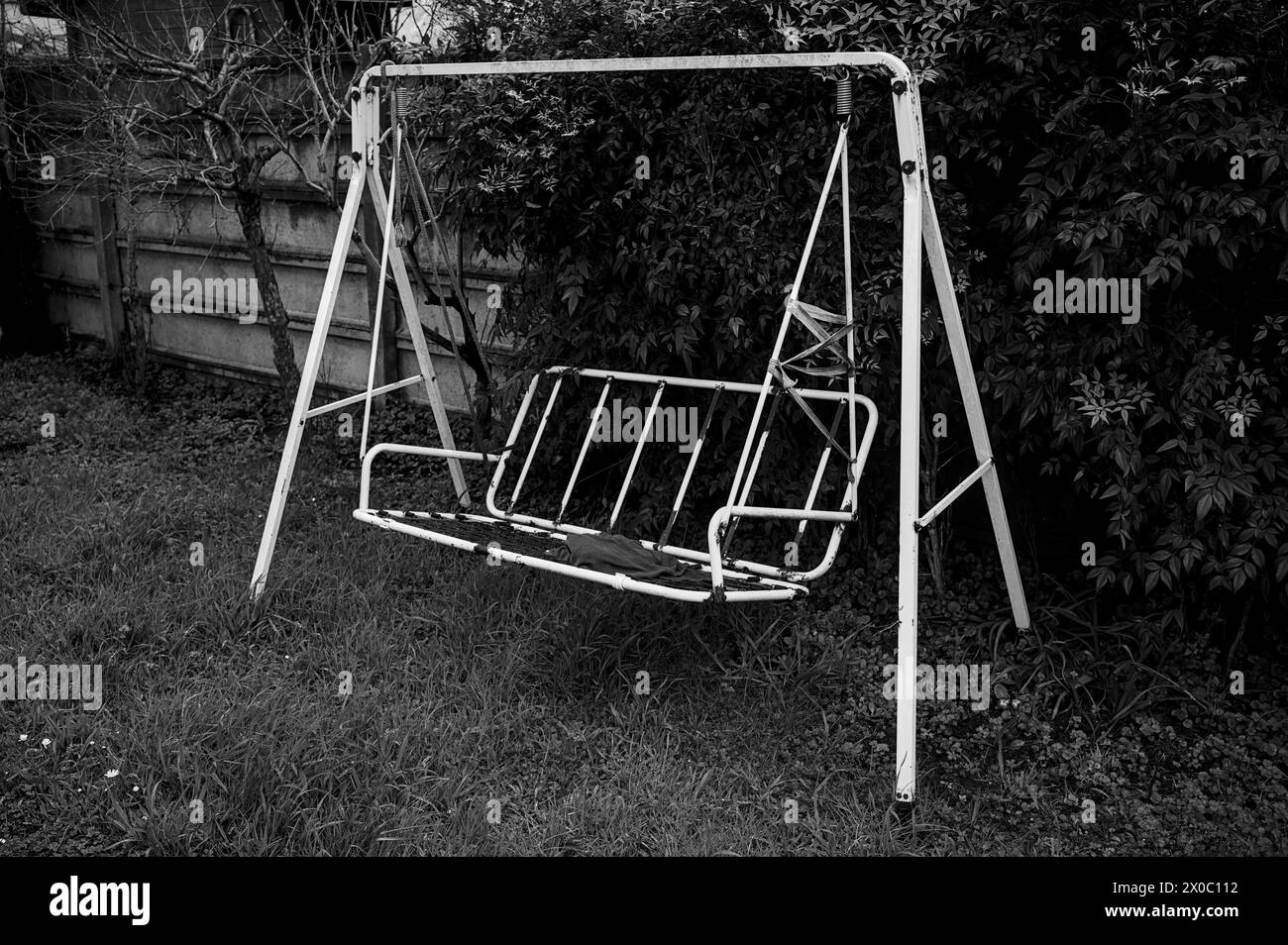 garden rocking chair in black and white Stock Photo