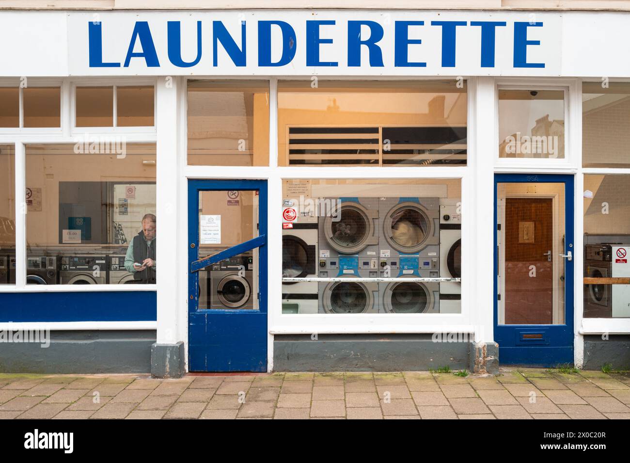 Launderette exterior in Teignmouth, Devon, England. Colour photography. Stock Photo