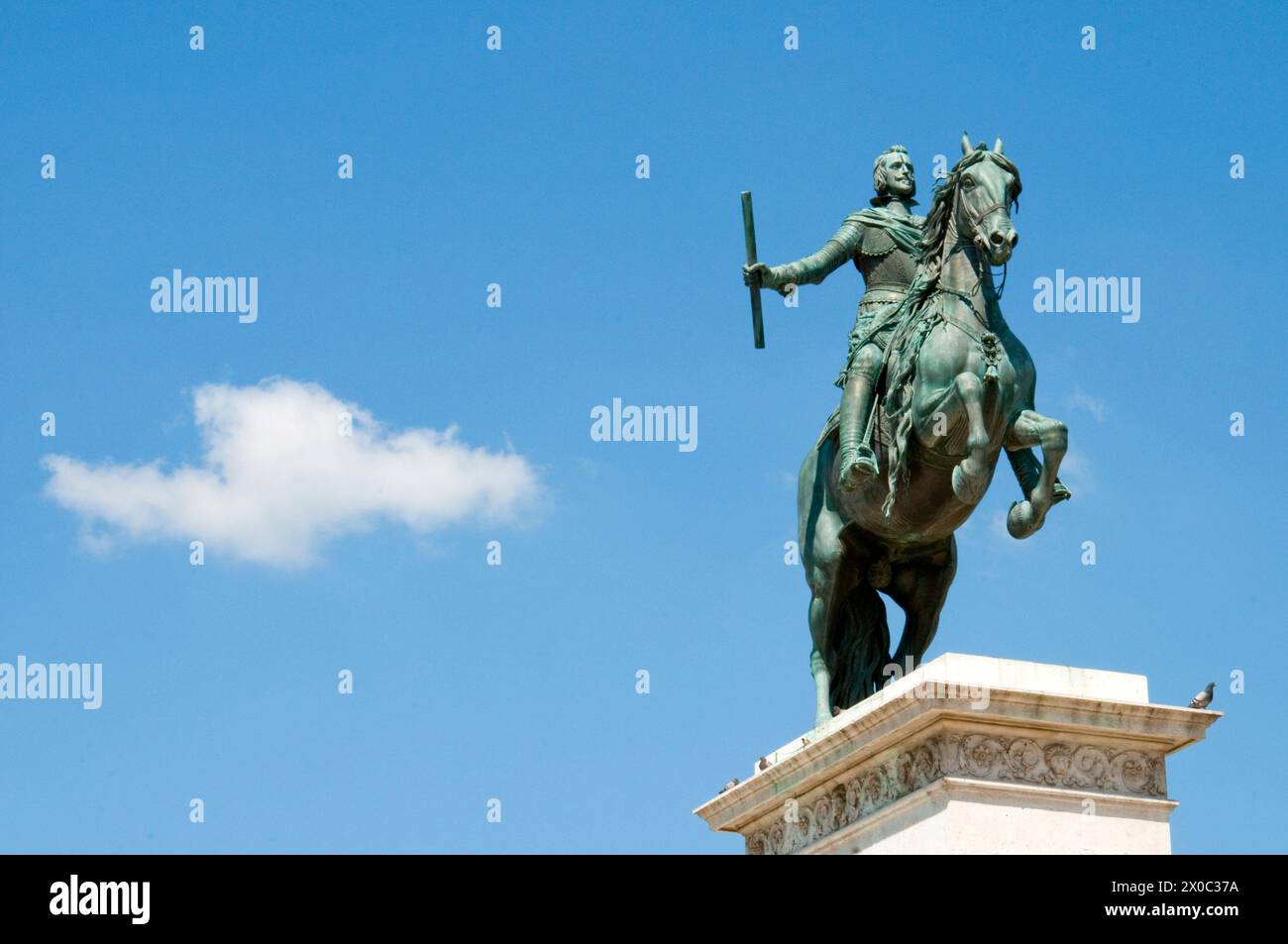 Felipe IV state against blue sky. Oriente Square, Madrid, Spain. Stock Photo