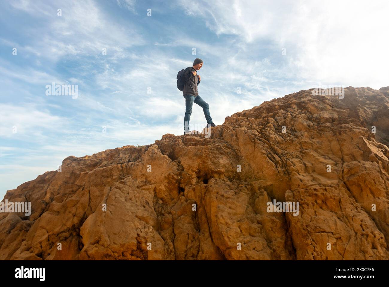 Male hiker walk up rocky hi-res stock photography and images - Alamy