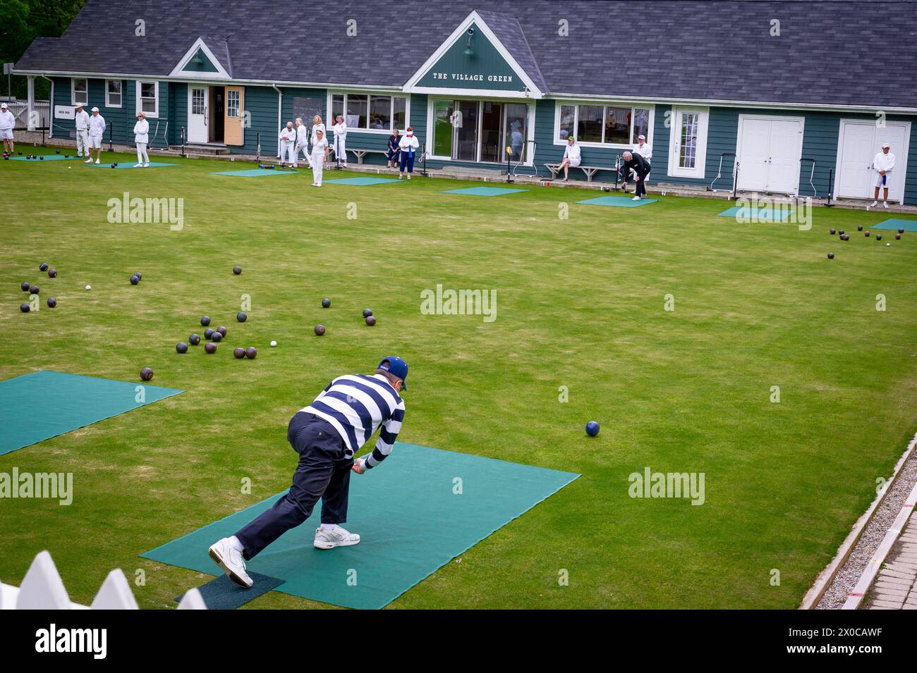 Seniors playing lawn bowling Stock Photo