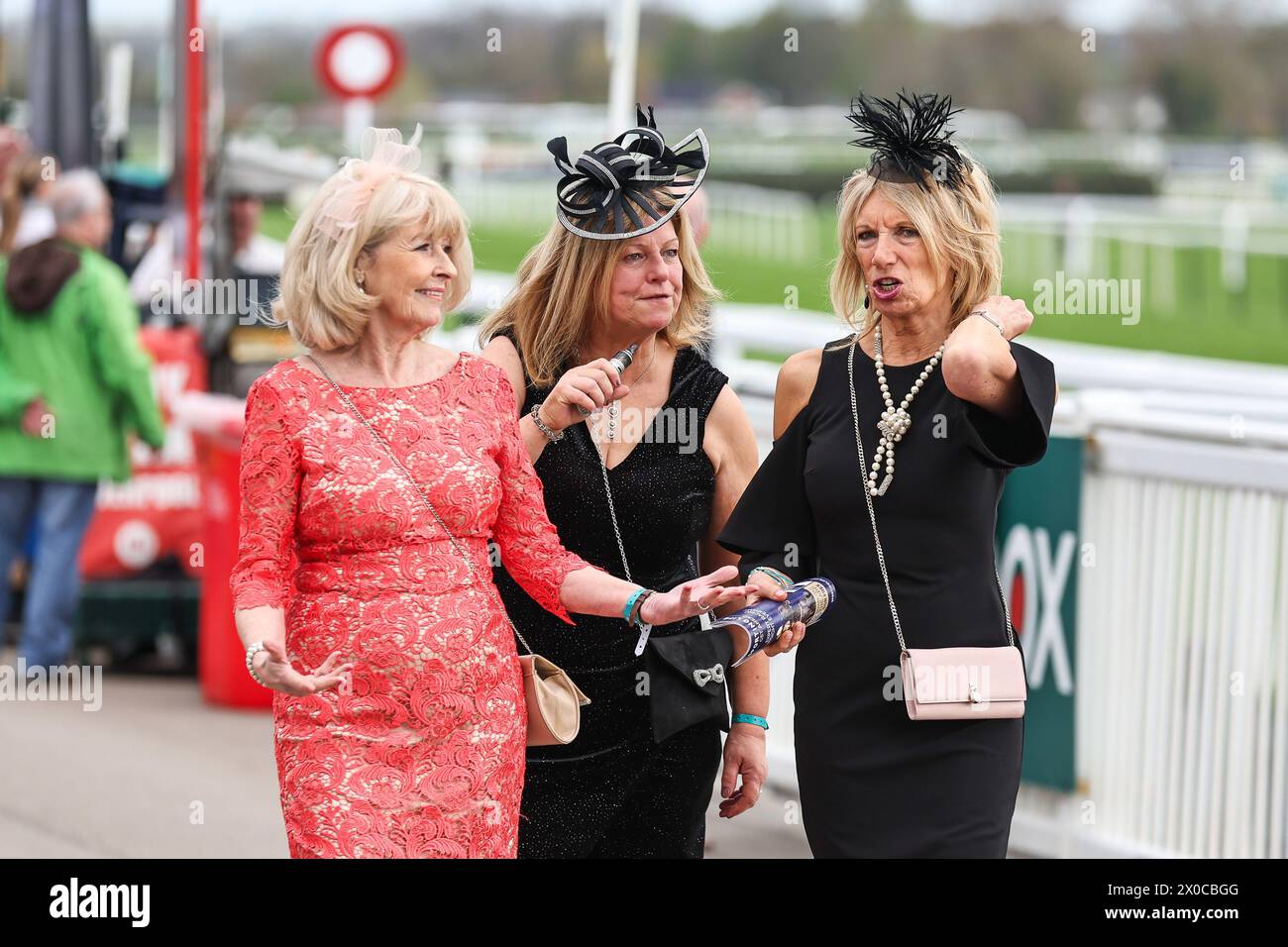 Racegoers arrive during the Randox Grand National 2024 Opening Day at