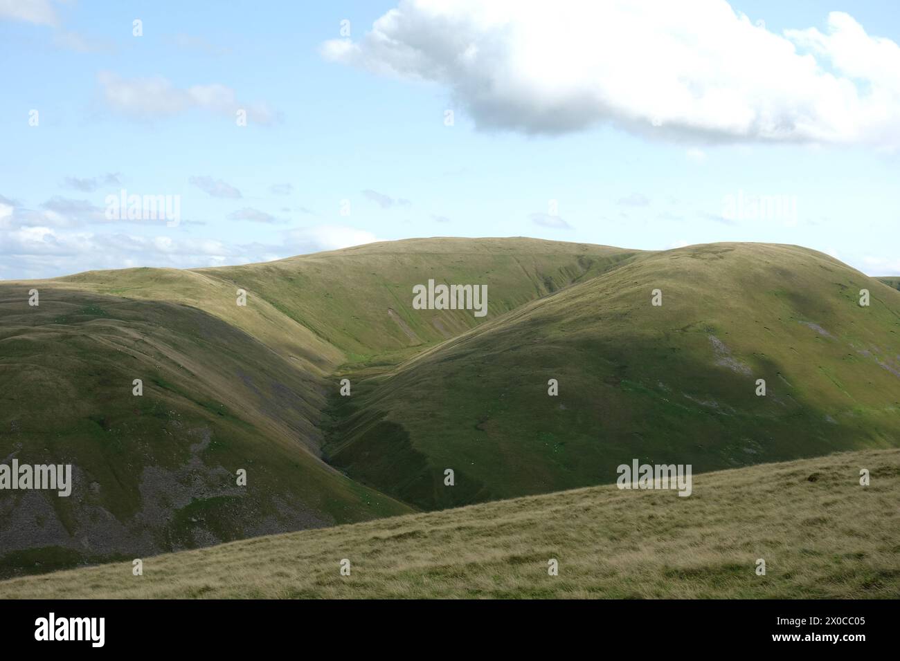 Great Swindale Gorge and 'Green Bell' by the Weasdale Valley in the  Howgills Hills, Yorkshire Dales National Park, England, UK. Stock Photo