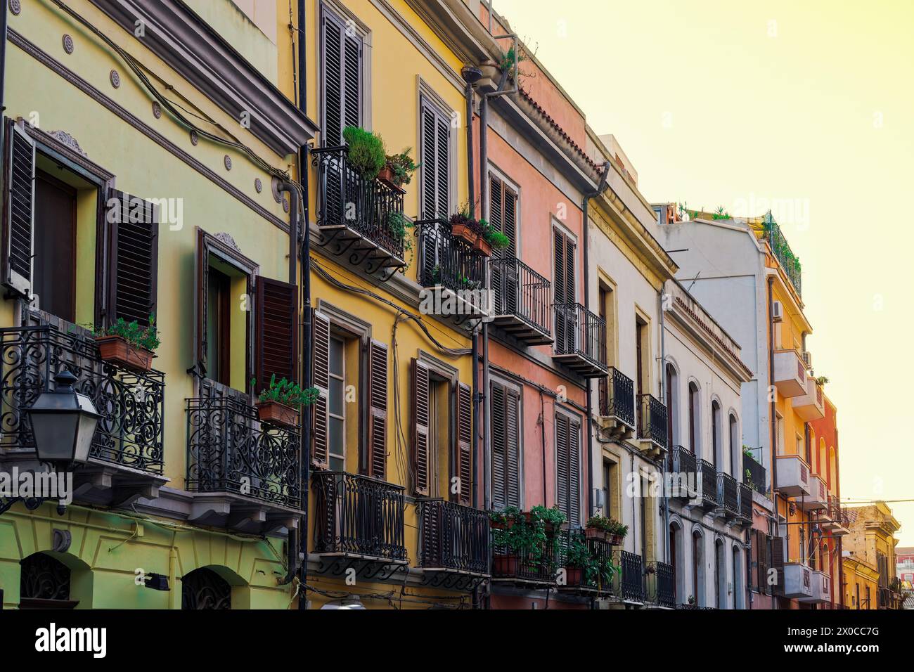 Cagliari historic center colorful buildings facade with wooden window ...