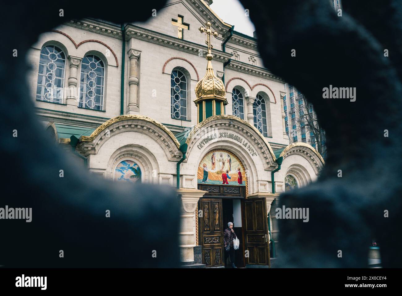The Shimbarea La Fata Orthodox Cathedral in Chisinau, with a person leaving the Cathedral. Patricia Huchot-Boissier / Collectif DyF Stock Photo