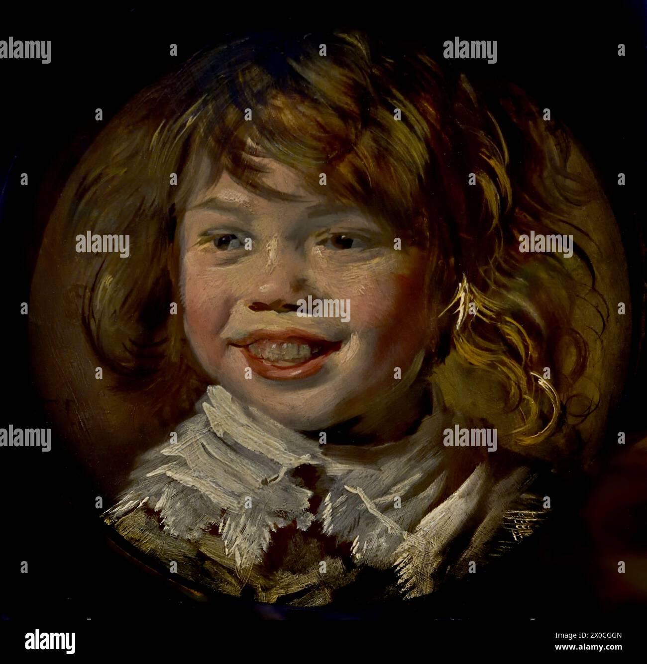 Lachende Jongen - Smiling Boy ( This cheerfully laughing boy with sparkly eyes and dishevelled hair is not a portrait, but a 'tronie' – a study of a laughing child. ) by  Frans Hals, 1582-1666, Antwerp- Haarlem,  Dutch, The Netherlands, 17th century, Dutch Golden Age  ( He painted lively, sometimes even cheerful, portraits of people from all levels of society,  important people, naughty children and even drunks or people who had been declared crazy. ) Stock Photo