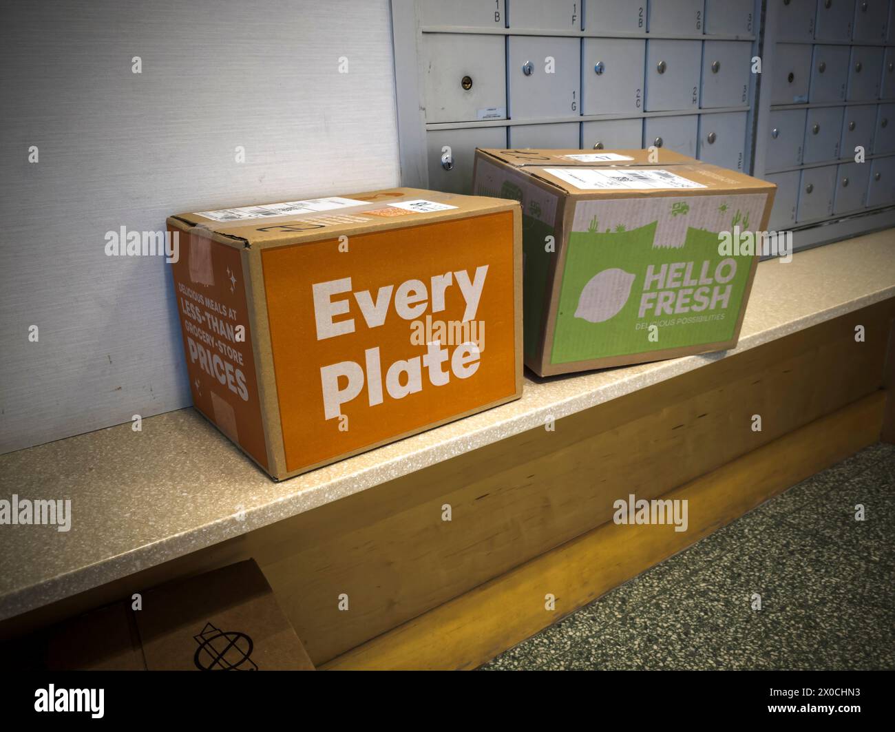 Deliveries from the Every Plate and Hello Fresh meal subscription services wait to be picked up in the lobby of an apartment building in New York on Tuesday, April 9, 2024. (© Richard B. Levine) Stock Photo