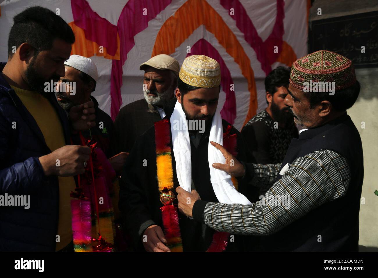 Muslims offer Eid-al Fitr prayers at Markazi Jamia masjid in Patipora Pulwama's District South Kashmir. Authorities have been disallowing congregational prayers at the main Jamia Masjid Mosque on many Fridays and Eid al-Fitr to avert any law and order situation. However, in other parts of Kashmir, prayers were offered in mosques and shrines. The biggest Eid congregation was held at Hazratbal shrine in Srinagar. Muslims worldwide celebrate Eid al-Fitr, a two or three-day festival, at the end of the Muslim holy fasting month of Ramadan. It is one of the two major holidays in Islam. During Eid al Stock Photo