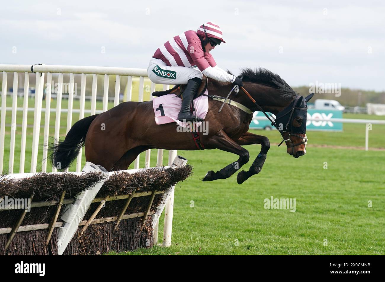 Dirty Den ridden by Benjamin Poste during the Boodles Anniversary 4-Y-O Juvenile Hurdle on day one of the 2024 Randox Grand National Festival at Aintree Racecourse, Liverpool. Picture date: Thursday April 11, 2024. Stock Photo