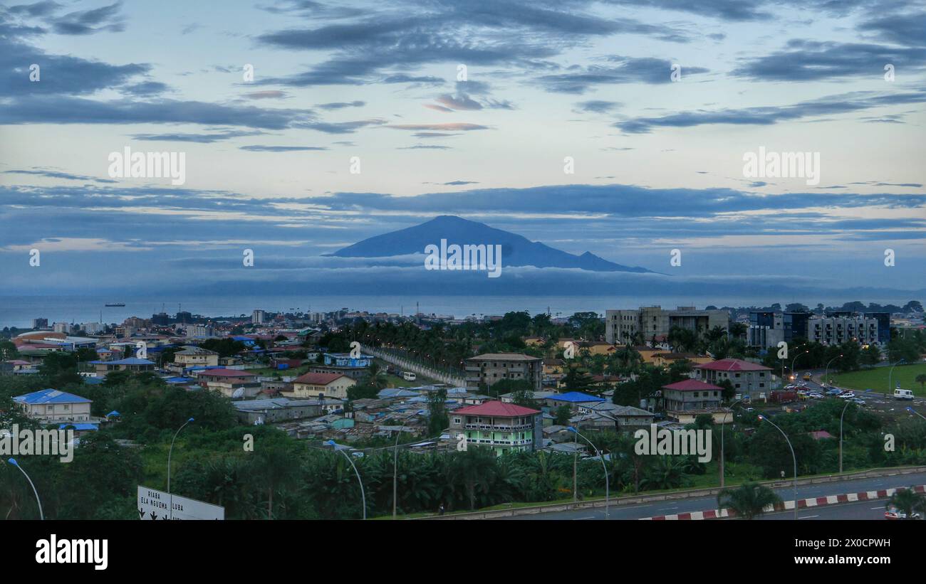 Mount Victoria of Cameroon seen from Malabo. Against Sky During Sunset in Malabo, Equatorial Guinea. Stock Photo