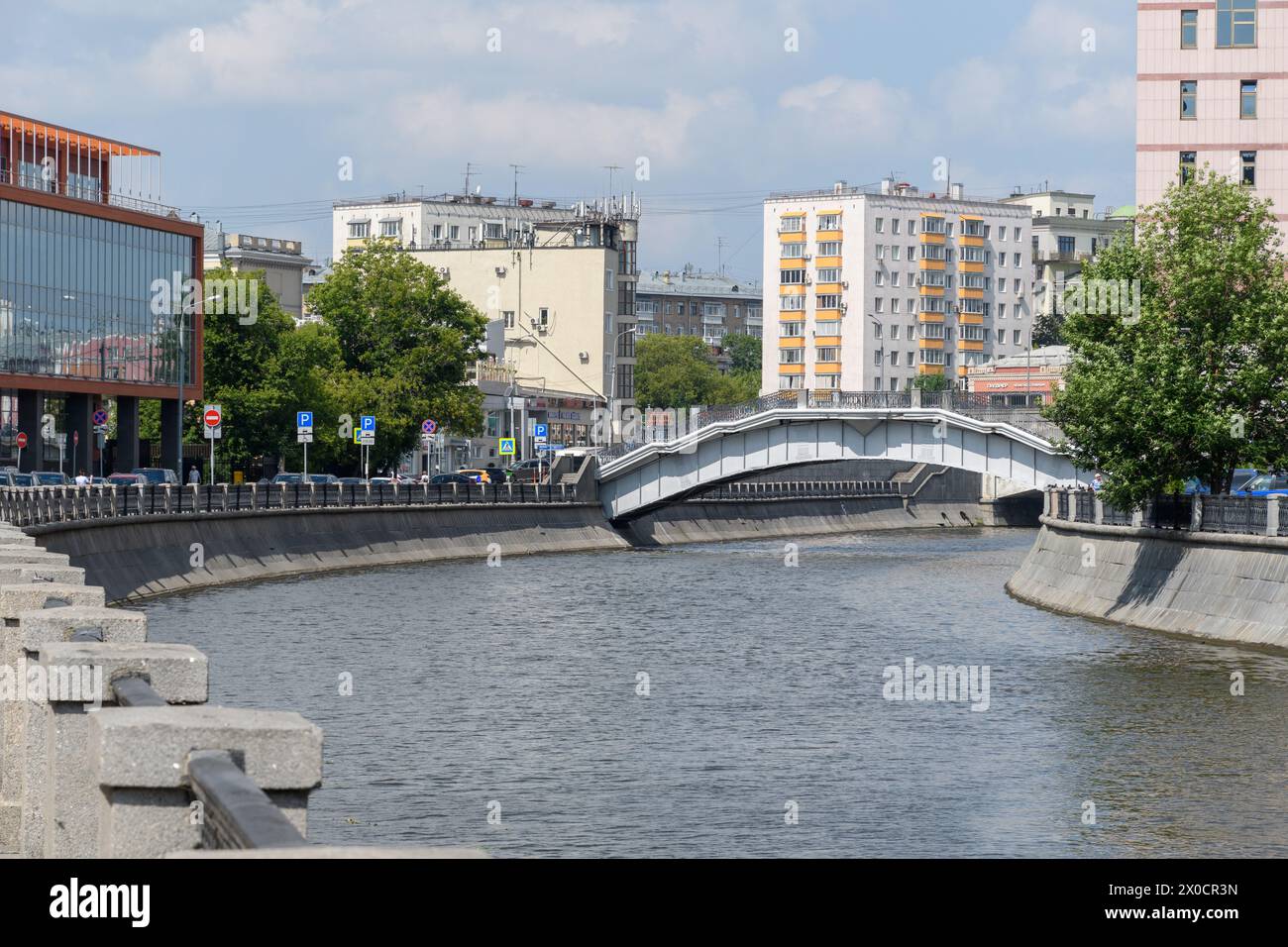 Moscow, Russia - 17 Jul 2018: A serene moment captured where architectural innovation meets natural beauty, showcasing a peaceful coexistence in the h Stock Photo