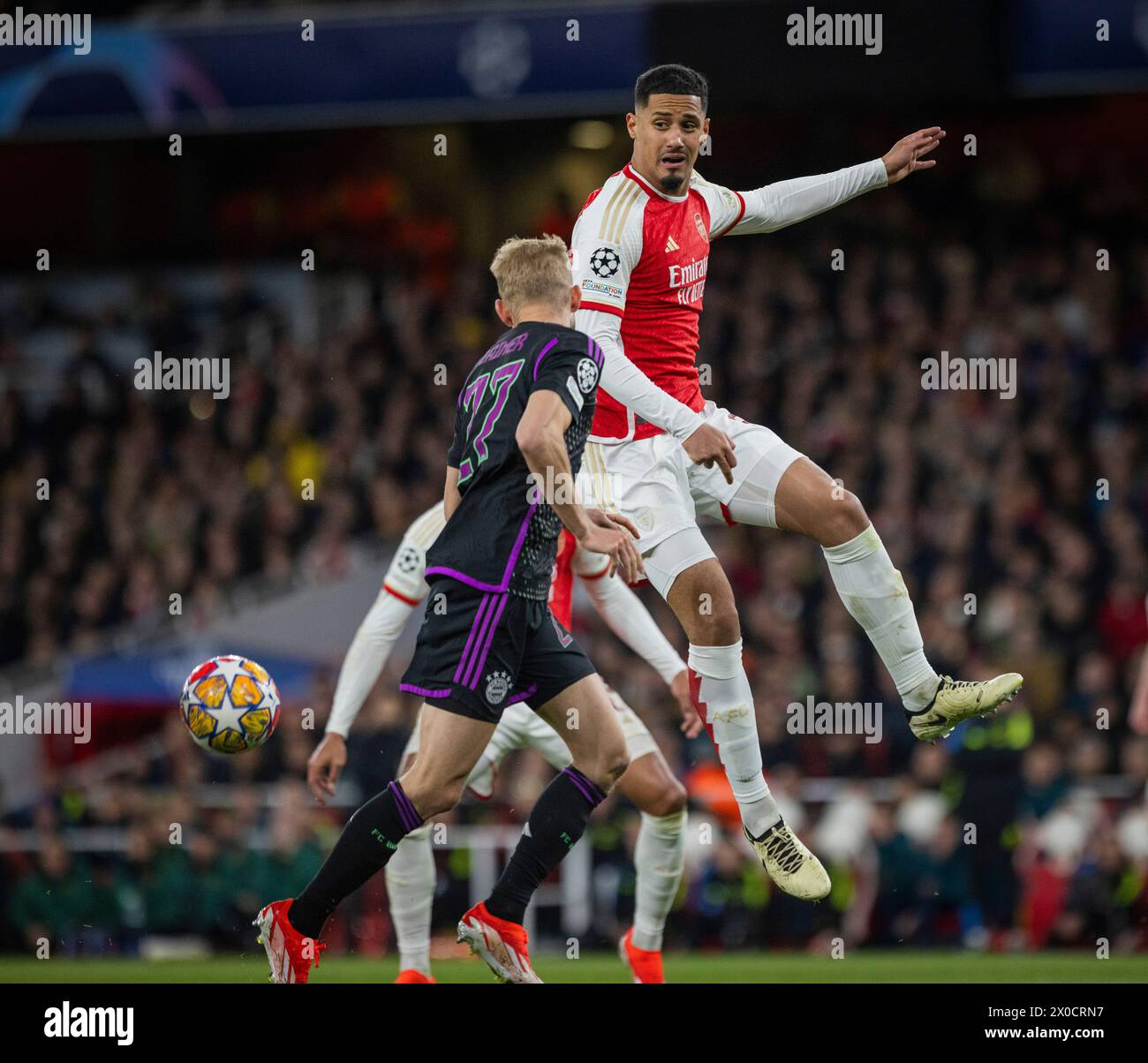 London, England. 09th Apr 2024.  Konrad Laimer (Muenchen) William Saliba (Arsenal) Arsenal London - Bayern Munich Arsenal London - Bayern München 09.0 Stock Photo