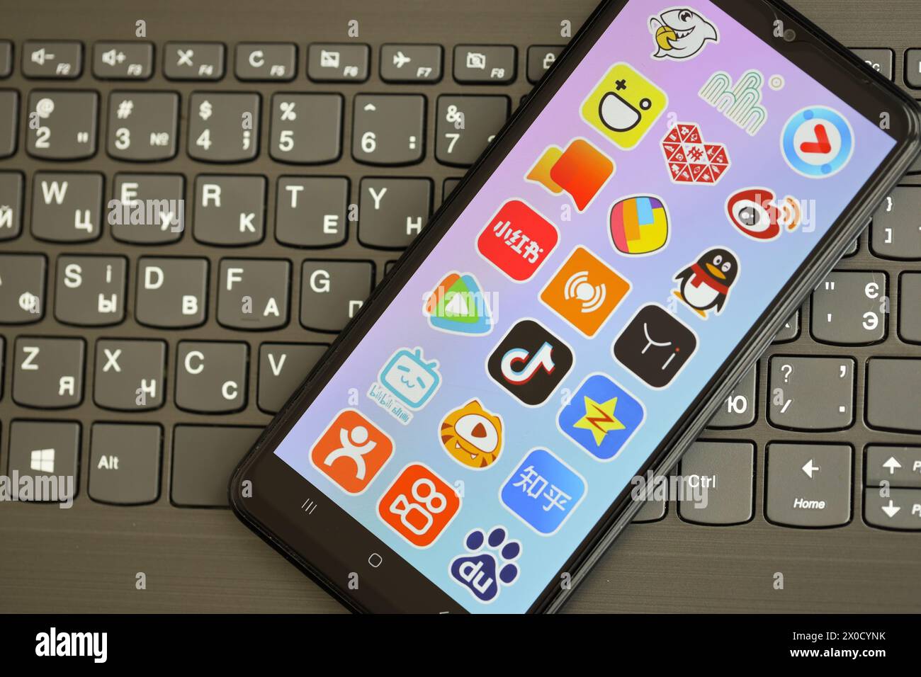 KYIV, UKRAINE - APRIL 1, 2024 Asian apps icon on smartphone screen on ...