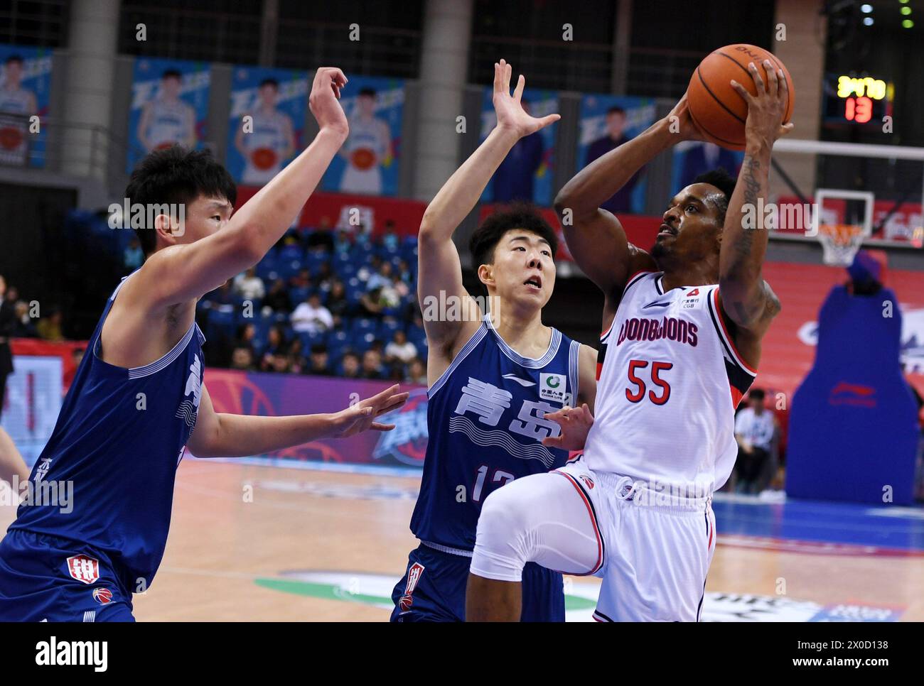 Qingdao, China's Shandong Province. 11th Apr, 2024. Barry Brown (R) of Guangdong Loong Lions goes for a lay-up during the play-off first leg match between Guangdong Loong Lions and Qingdao Eagles at the 2023-2024 season of the Chinese Basketball Association (CBA) league in Qingdao, east China's Shandong Province, April 11, 2024. Credit: Li Ziheng/Xinhua/Alamy Live News Stock Photo