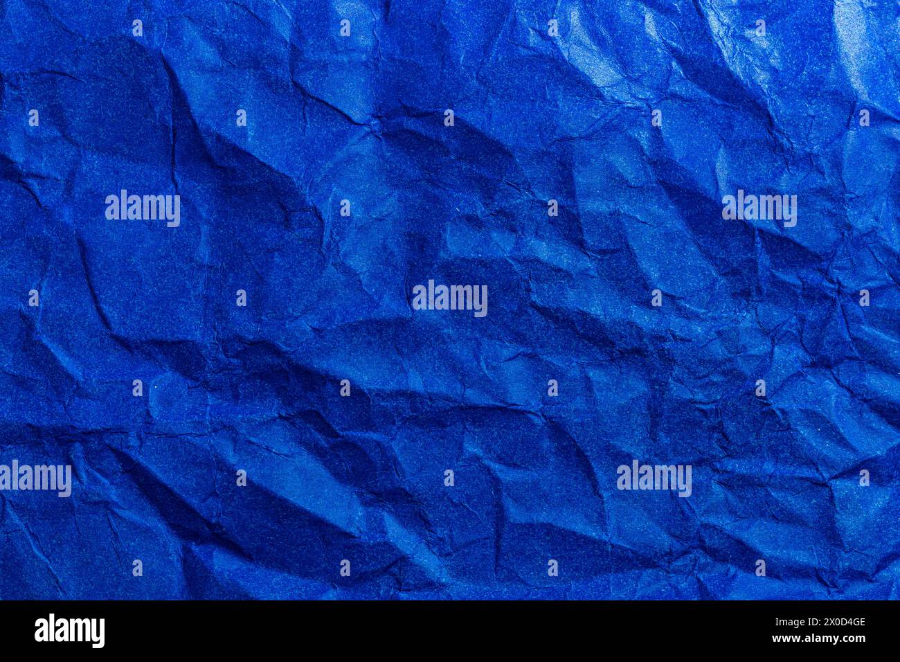 Blue Paper Texture background. Crumpled Blue paper abstract shape background. Stock Photo