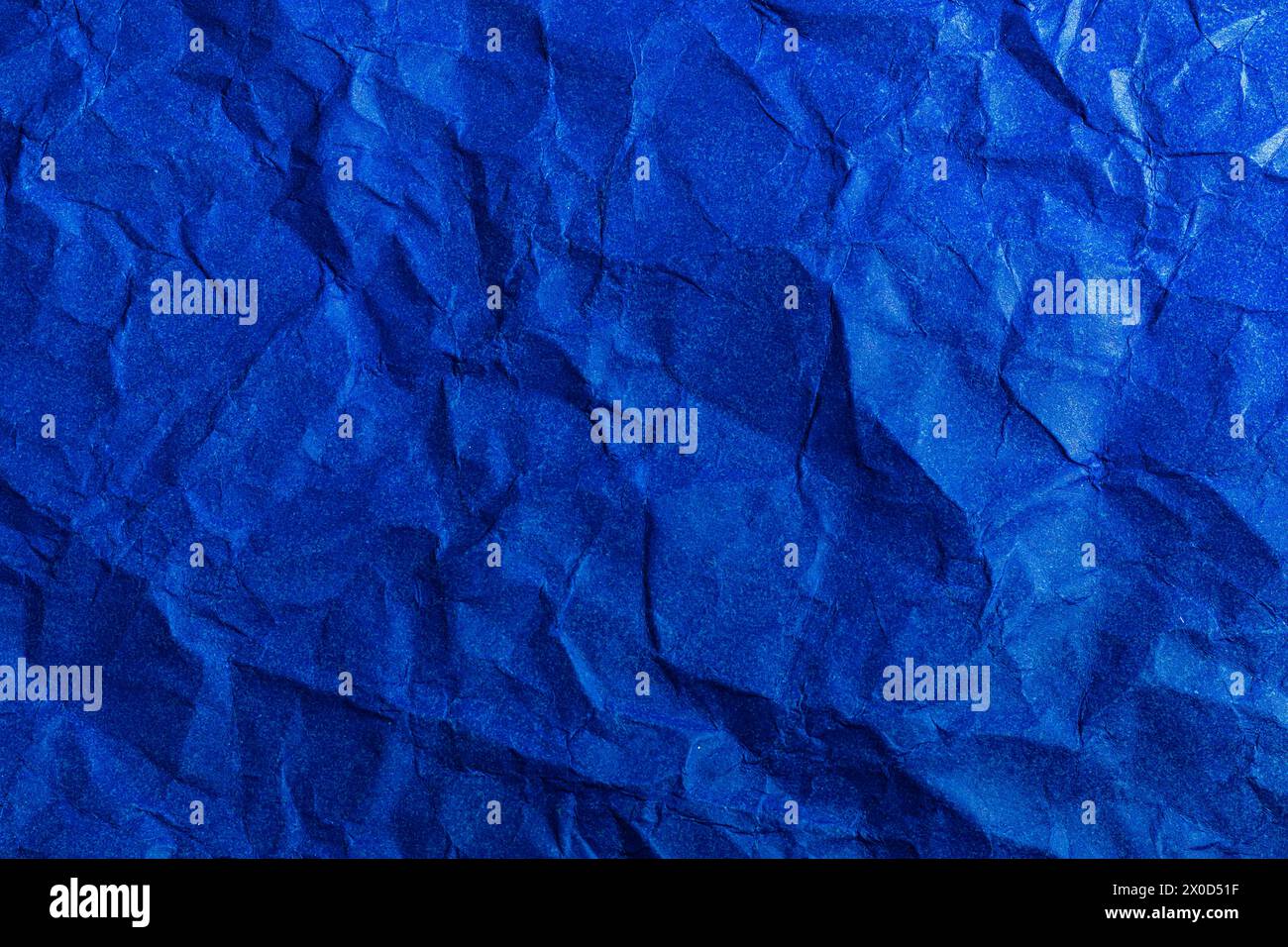 Blue Paper Texture background. Crumpled Blue paper abstract shape background. Stock Photo