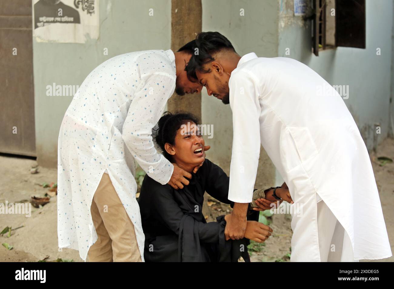 Dhaka, Wari, Bangladesh. 11th Apr, 2024. A relative reacts after seeing ...