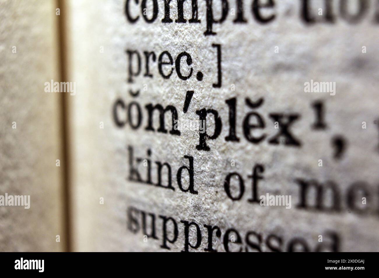 Word complex on dictionary page, macro close-up Stock Photo