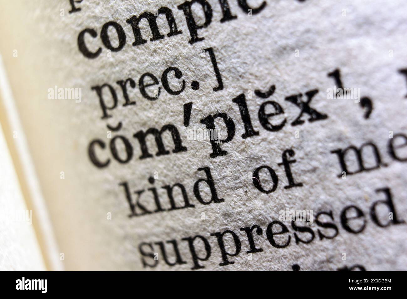 Word complex on dictionary page, macro close-up Stock Photo