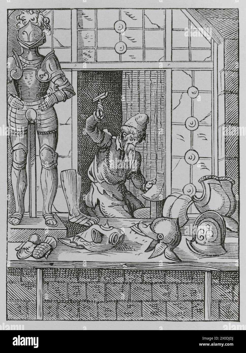 The trades. The armourer. Facsimile after a drawing and engraving by Jost Amman in the 16th century. 'Moeurs, usages et costumes au moyen-âge et à l'époque de la Renaissance', by Paul Lacroix. Paris, 1878. Stock Photo