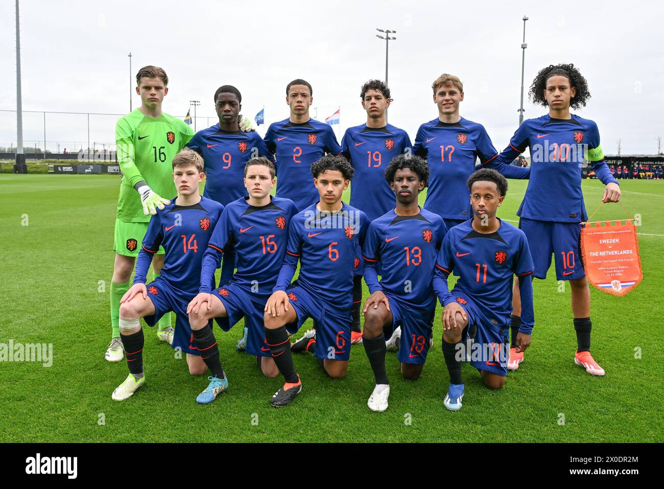 players of The Netherlands with goalkeeper Finn Mulder (16) of The Netherlands, Pharell Nash (9) of The Netherlands, Christopher Fafiani (2) of The Netherlands, Jason Inocencio (19) of The Netherlands, Sil Blokhuis (17) of The Netherlands, Shuryjano Cornecion (10) of The Netherlands, Thijs van Ingen (14) of The Netherlands, Ties Kemna (15) of The Netherlands, Givaro Rahajaan (6) of The Netherlands, Djael Akloe (13) of The Netherlands and Mohamed Hassan Abdallah (11) of The Netherlands pose for a team photo during a friendly soccer game between the national under 16 Futures teams of Sweden and Stock Photo