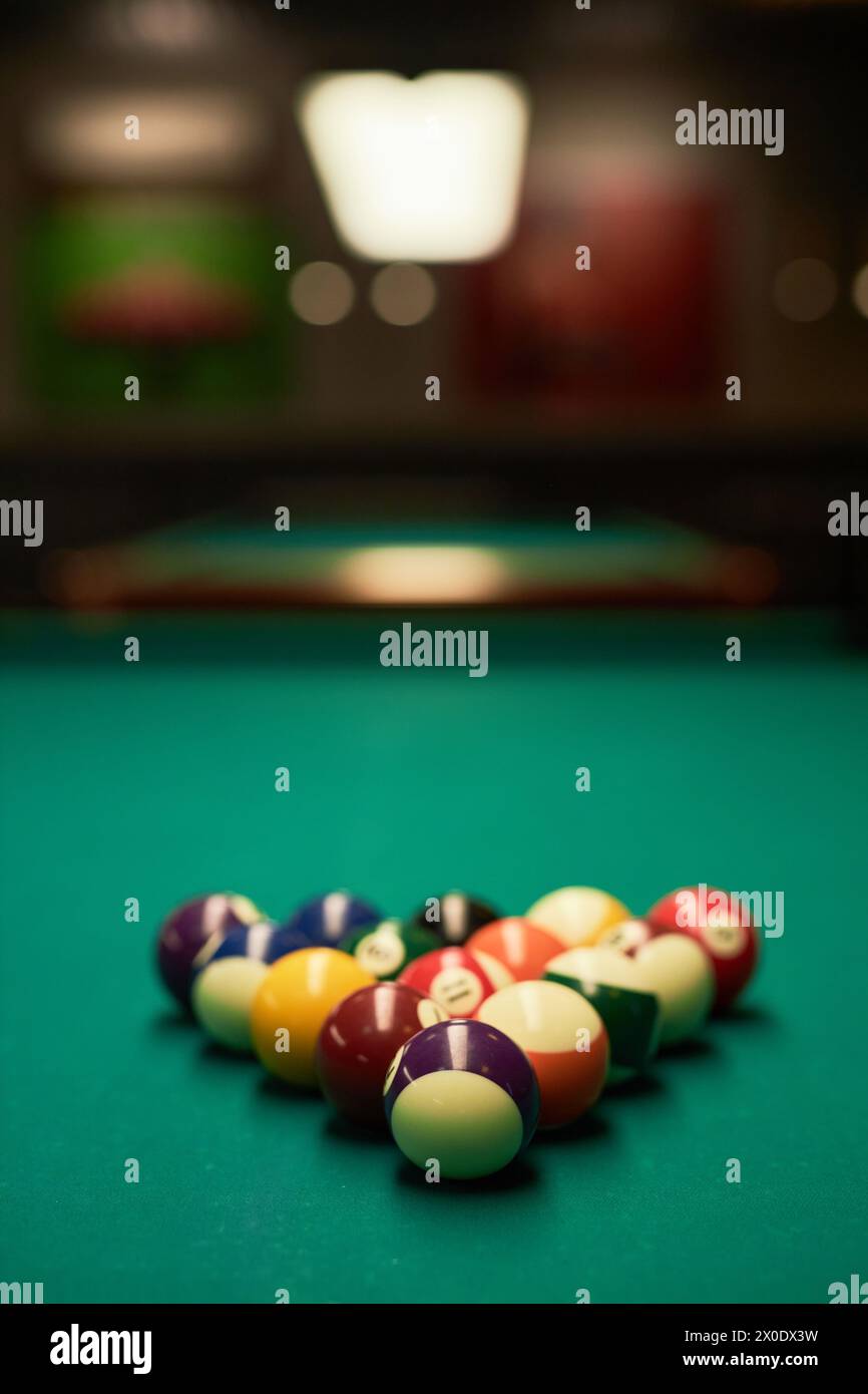 Vertical background image of billiard balls set in triangle on green ...