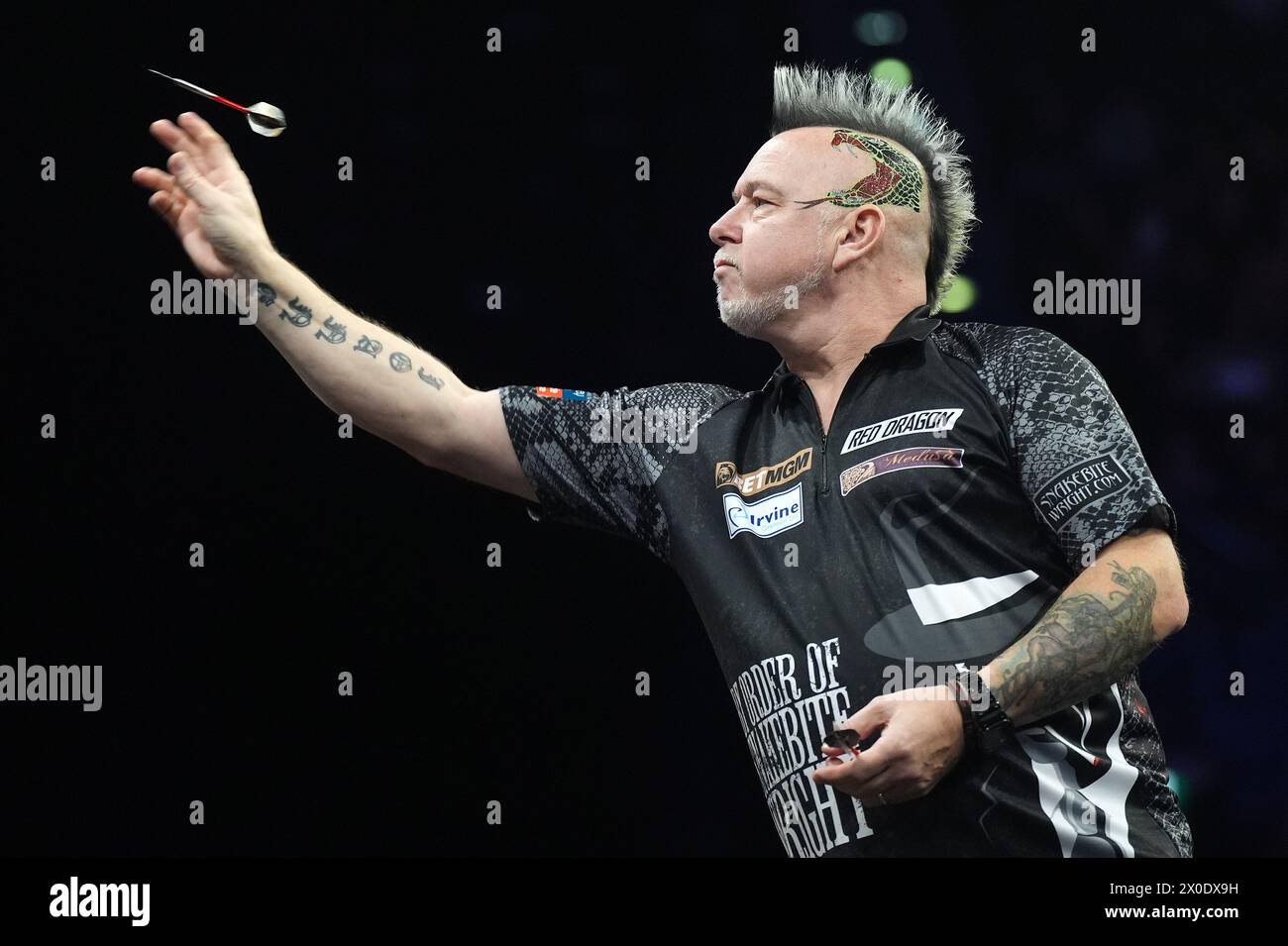 Peter Wright in action during his match against Luke Humphries (Not pictured) on night eleven of