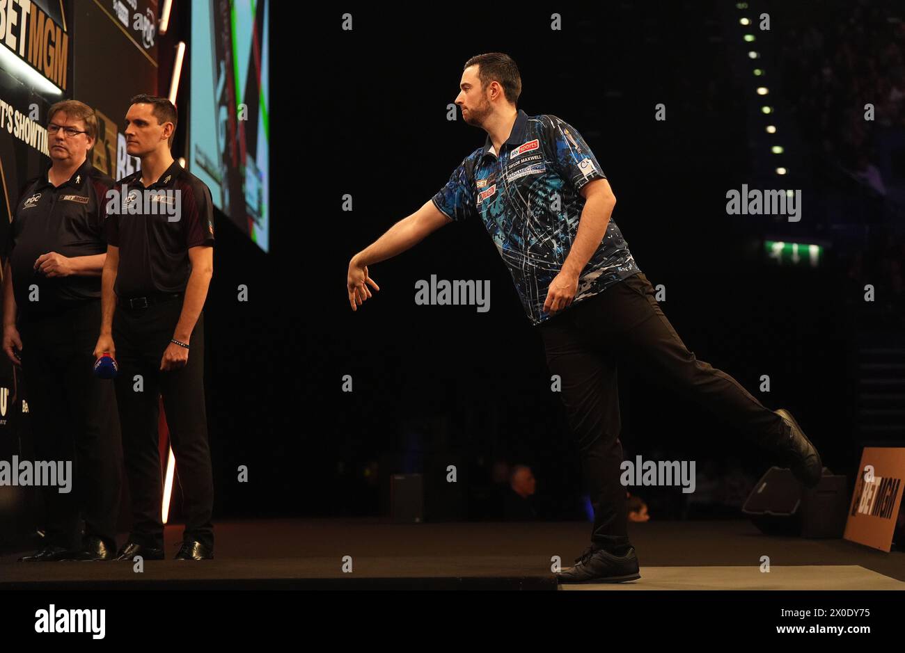 Luke Humphries in action against Peter Wright (Not pictured) on night eleven of the 2024 BetMGM