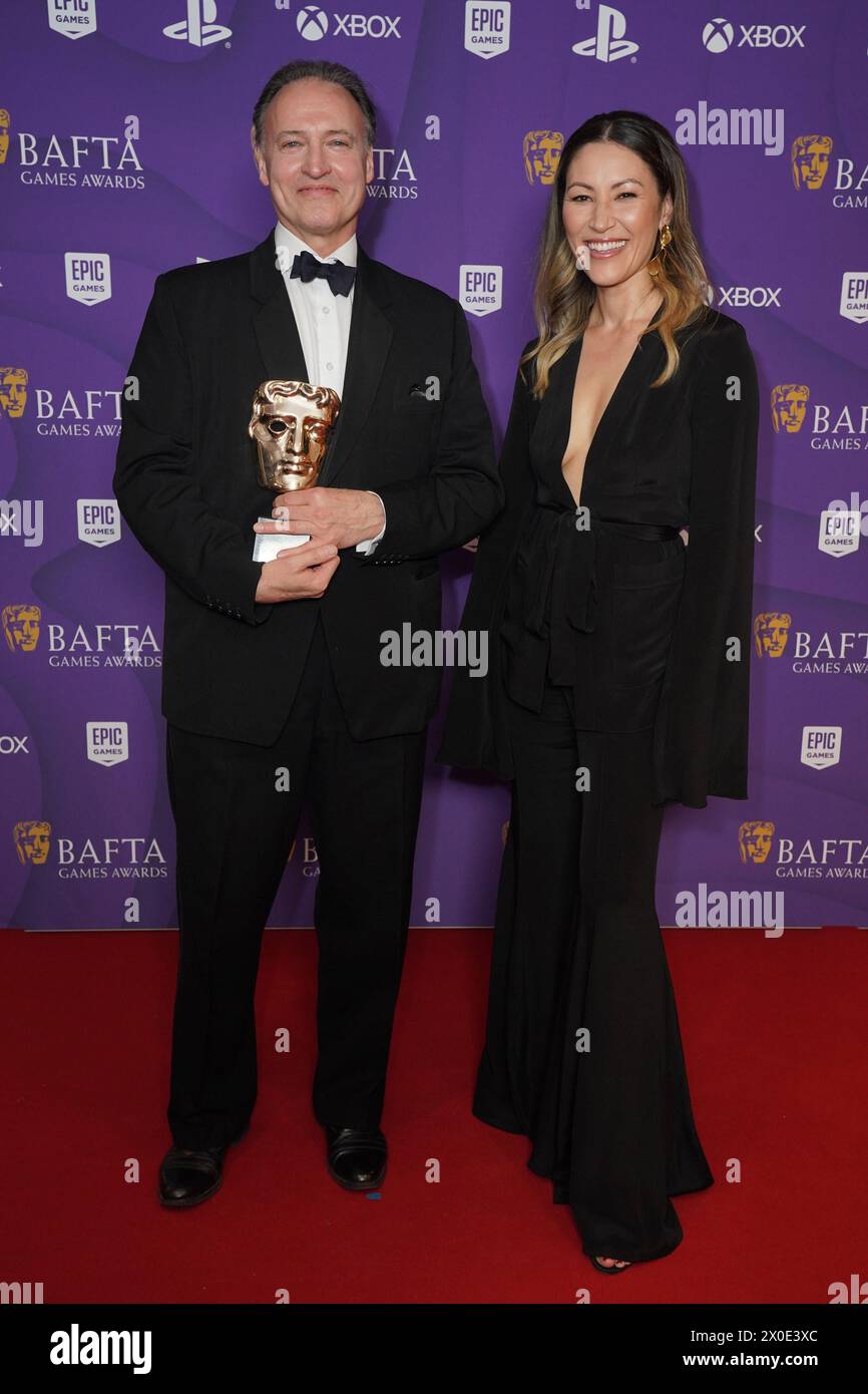 Andrew Wincott with Eleanor Matsuura after receiving the Performer in a ...