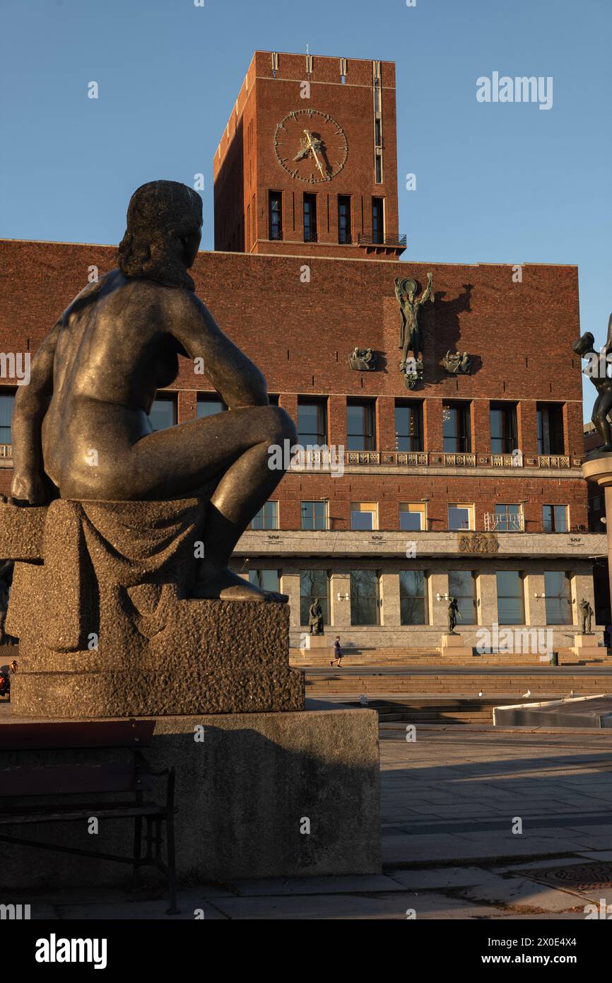 Statues at Rådhusplassen, Oslo, Norway. Rådhusplassen ('The City Hall Square') is a square located between Oslo City Hall and the Oslofjord in Vika. Stock Photo