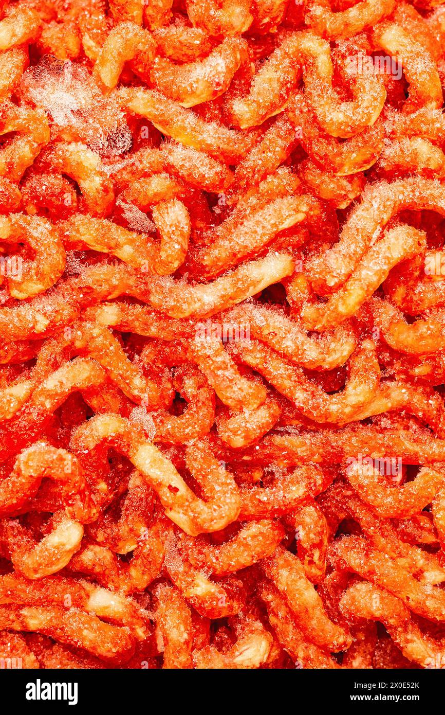 fresh minced meat in packaging, close-up shot. frozen fresh minced meat. frozen minced fresh red meat close-up. vertical photo Stock Photo