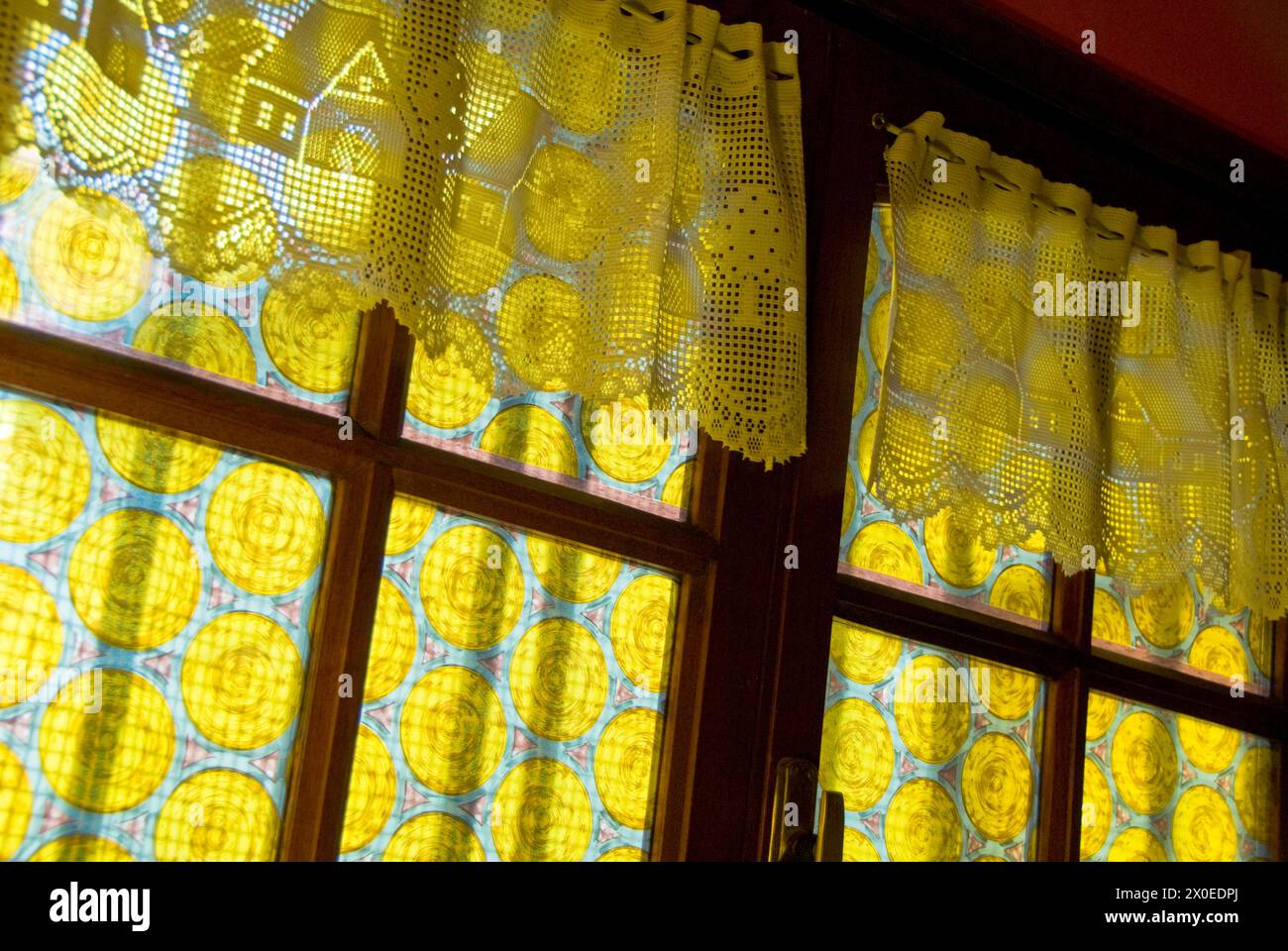 traditional lace curtains cover windows-Ushuaia, southernmost city in the world and the capital of the Tierra Del Fuego, Antarctica and Southern Stock Photo