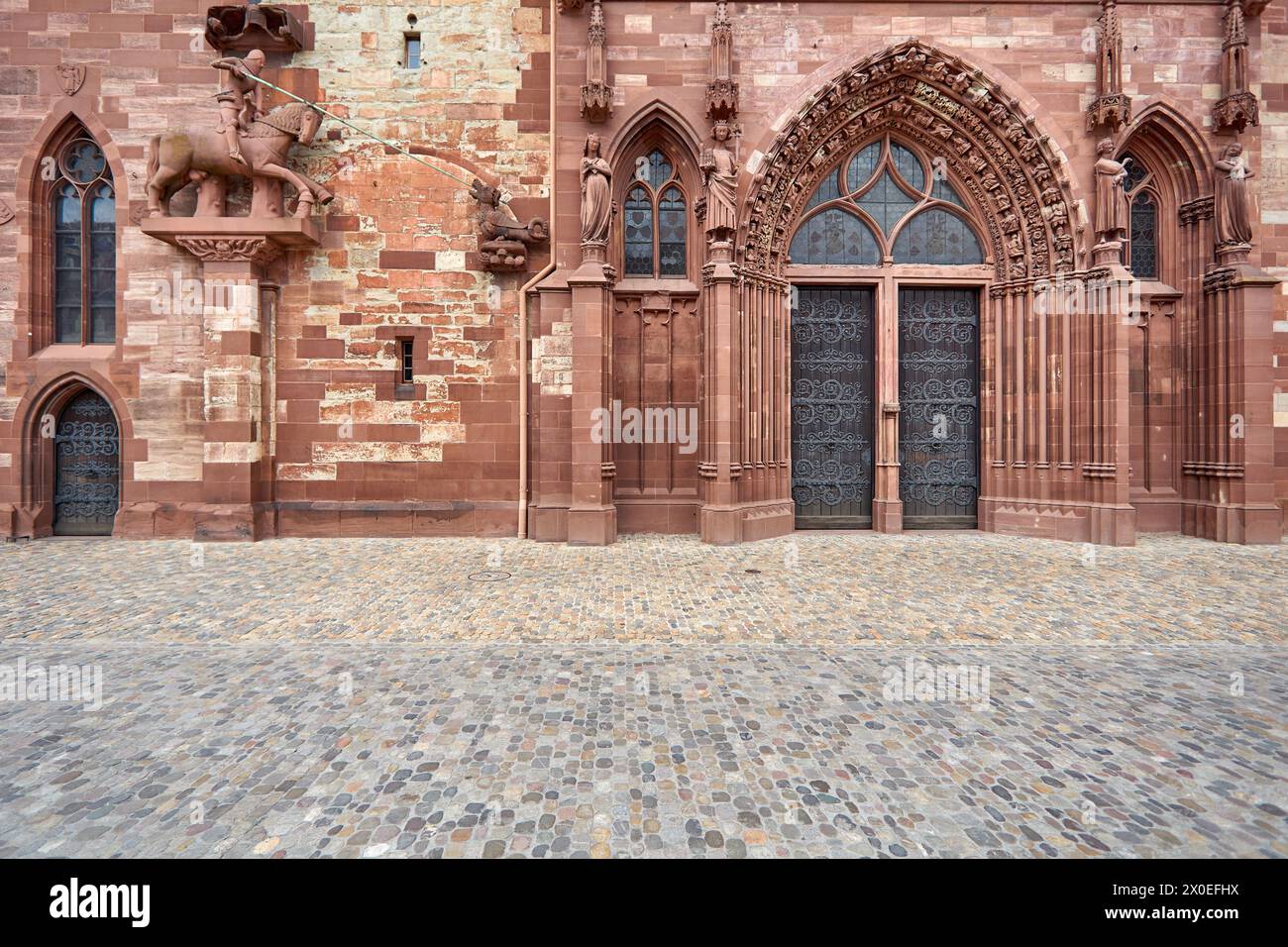 Gothic Basel Münster cathedral - facade with entrance and sculptures Stock Photo
