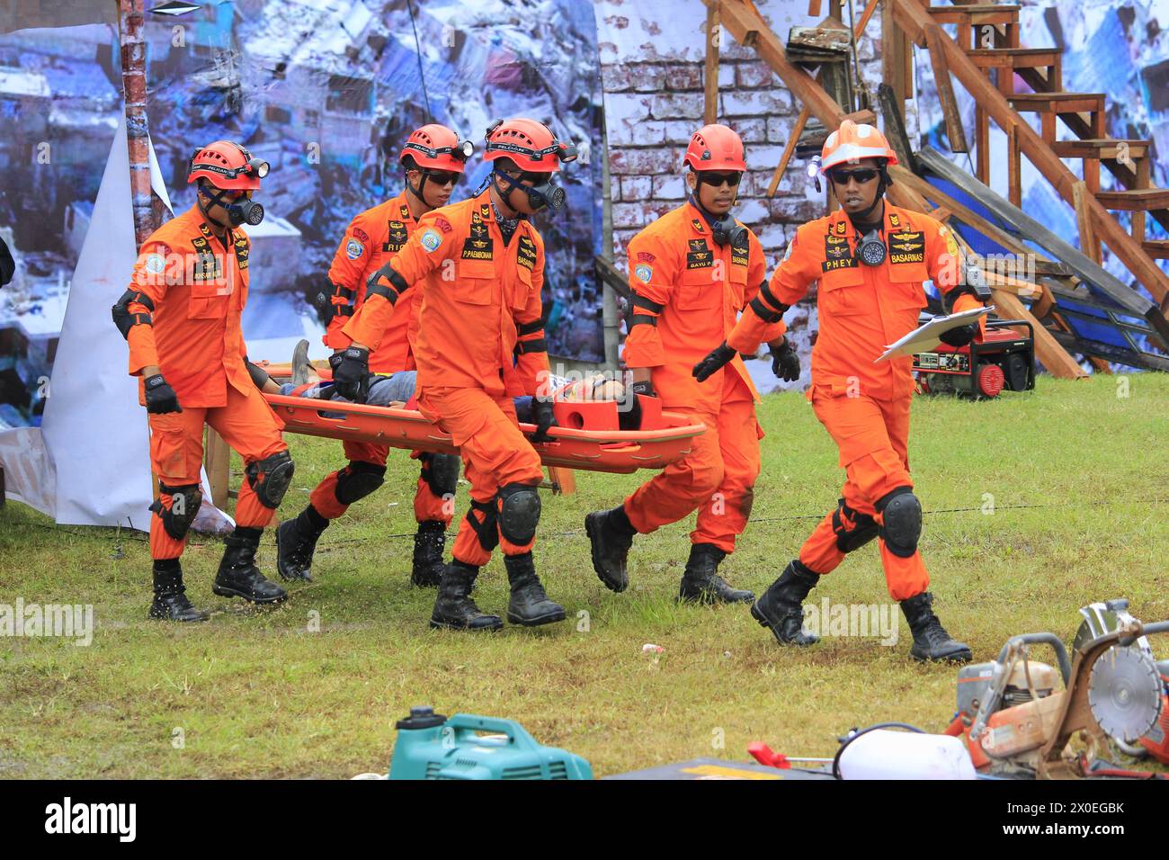 Action of the National Search and Rescue Agency BASARNAS evacuated victims of natural disasters in simulating earthquake response. Stock Photo